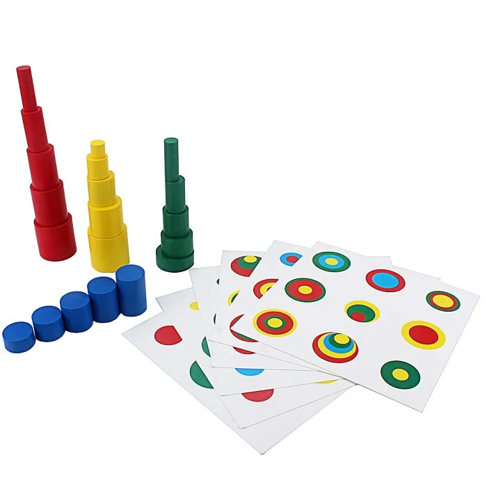 A set of colorful wooden cylinder blocks in red, yellow, and green stacked vertically.