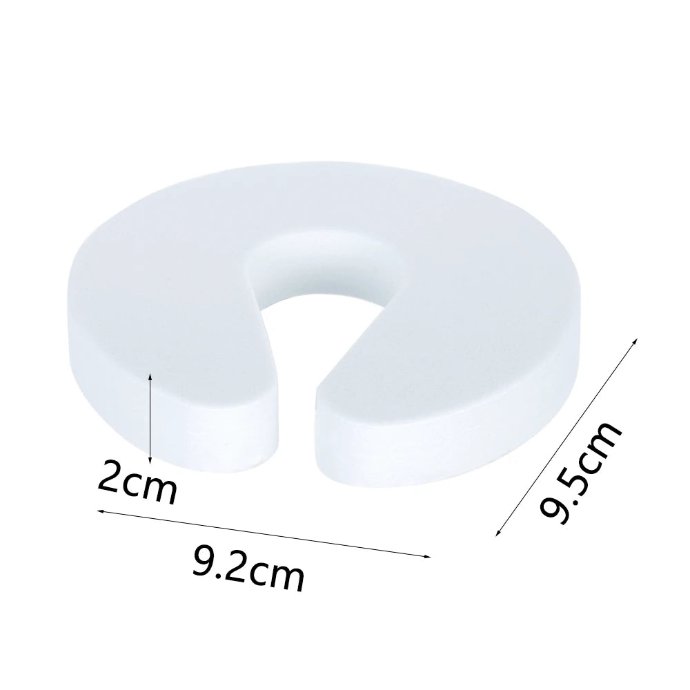 Tapón de puerta de espuma EVA blanca con dimensiones de 9.5 cm de alto y 9.2 cm de ancho.