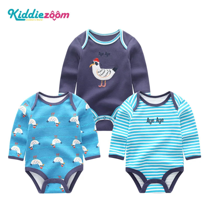 A set of three cotton baby bodysuits with long sleeves in blue and white stripes