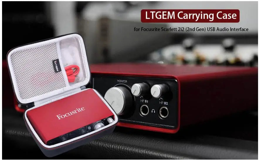 A red carrying case for the Focusrite Scarlett 2i2 USB Audio Interface is shown open on a dark surface.