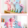 A plush toy of a musical walking unicorn in pink, white, and blue colors standing on a wooden surface.