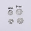 Two silver-toned flower petal bead caps, one 7mm and one 9mm, for jewelry making.