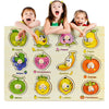 A wooden puzzle set featuring various fruits and vegetables like apples, mangoes, strawberries, bananas, and lemons.