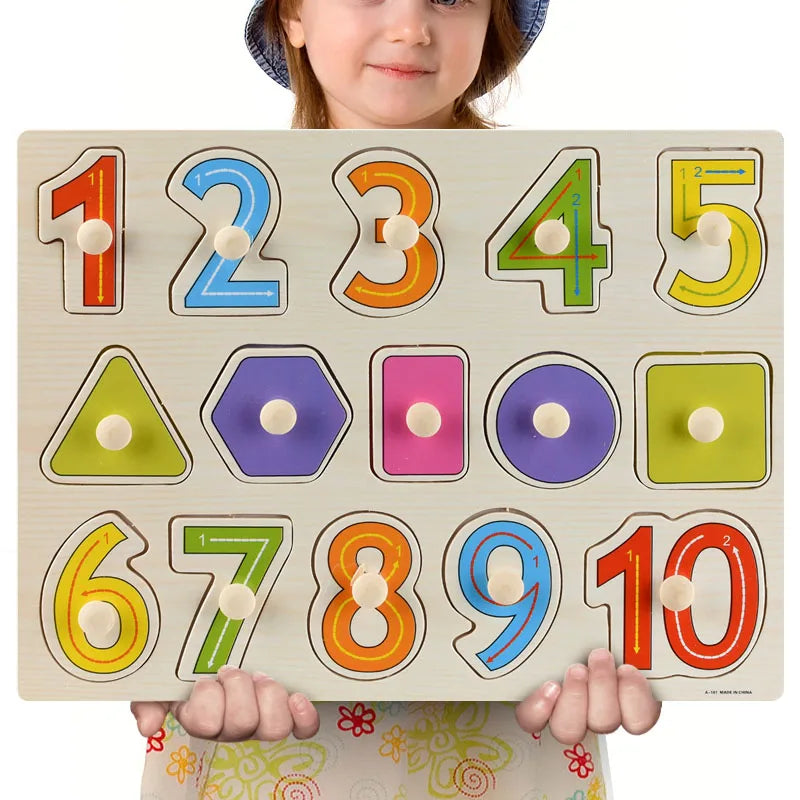 A wooden puzzle set featuring numbers and shapes for toddlers, held by a child.