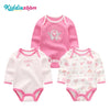 A pink cotton baby bodysuit 3-pack with long sleeves featuring a heart design and a floral pattern.