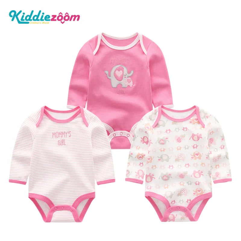 A pink cotton baby bodysuit 3-pack with long sleeves featuring a heart design and a floral pattern.