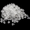 A pile of clear silicone earring backs for jewelry making.
