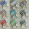 A collection of crystal rondelle spacer beads in various colors and clear stones for jewelry making.