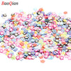 Assortment of colorful soft polymer clay slices for nail art and DIY crafts