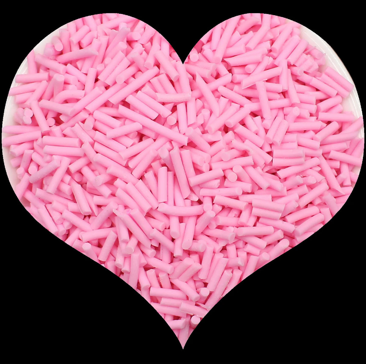 A heart-shaped mound of pink soft polymer clay candy sprinkles for cake decorating