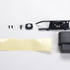A set of 1:12 scale RC car steering wheel and interior upgrade parts including various small components and a black mounting 