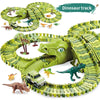 A green dinosaur track set featuring various dinosaurs and a racing car on a circular track.