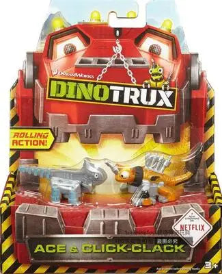 A Dinotrux toy truck car with removable dinosaur figures displayed in its packaging.