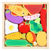 A wooden puzzle board for toddlers featuring various cartoon animals and fruits like a yellow fish, red watermelon slice, and