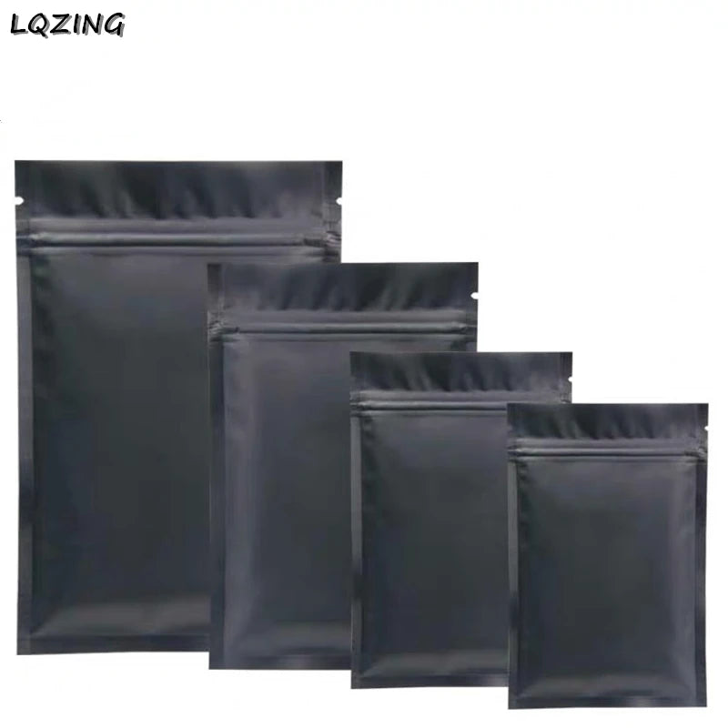 A collection of black mini reusable ziplock bags.