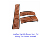 Three pieces of brown leather handle covers for a Mutsy iGo Urban Nomad stroller.