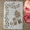 A clear silicone stencil featuring a floral vine pattern for crafting and wall art.