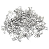 A pile of vintage metal key charms and antique keys for DIY jewelry making