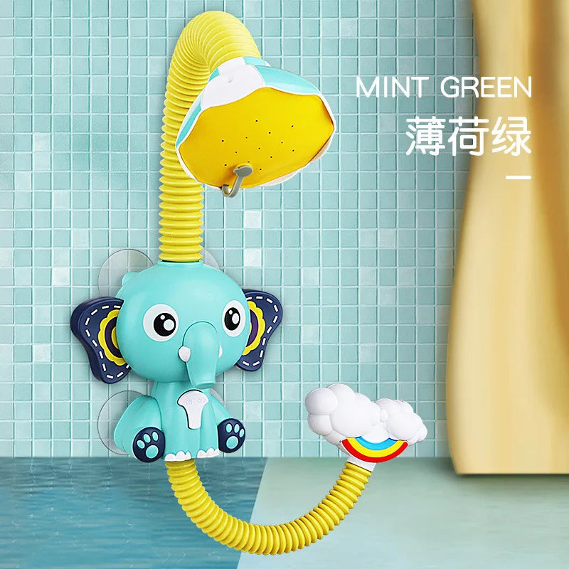 A yellow and blue elephant bath toy set with sliding tracks and a yellow spout, against a light blue tiled background.
