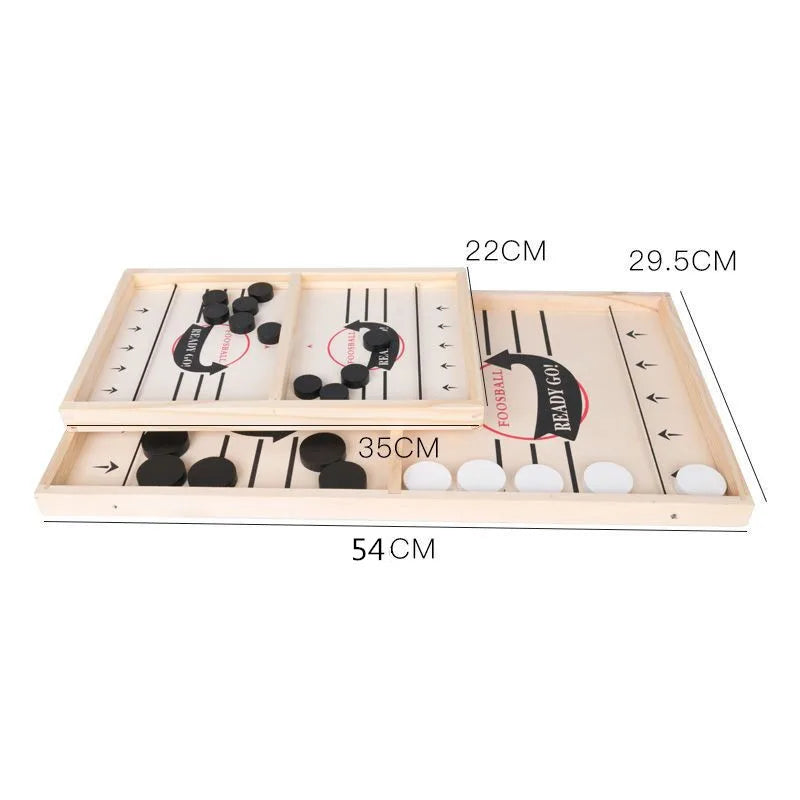 A wooden sling puck tabletop battle game for two players with a scoring board and pucks.