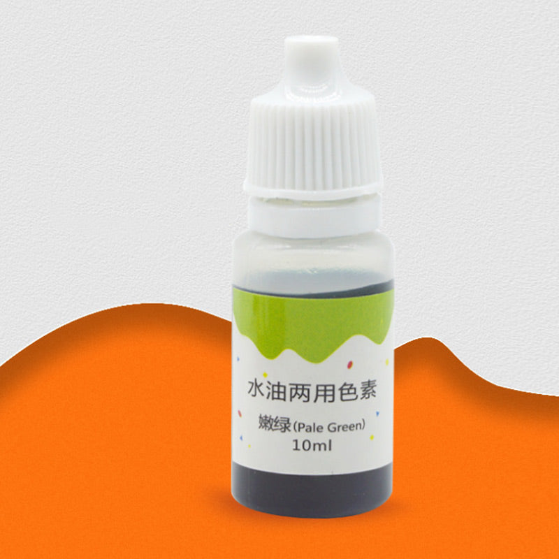 A small glass dropper bottle containing pale green liquid colorant for DIY projects