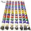 A set of polyhedral dice in various colors and shapes for role-playing games and board games