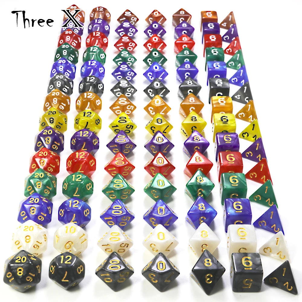 A set of polyhedral dice in various colors and shapes for role-playing games and board games