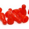 A collection of red plastic tokens used in a strategy card game.