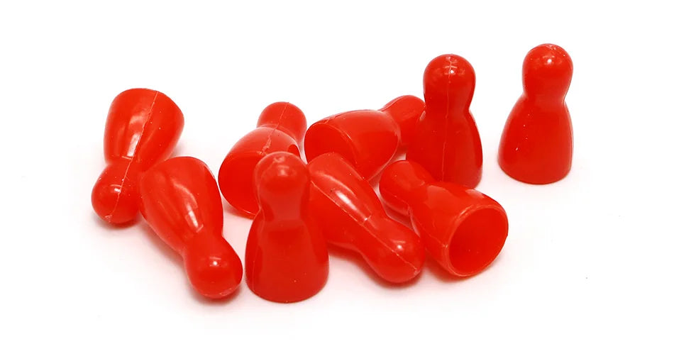 A collection of red plastic tokens used in a strategy card game.