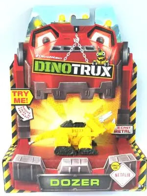 A Dinotrux dinosaur truck toy car with removable dinosaur figures displayed in its packaging.