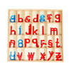 A wooden Montessori alphabet box containing red and blue letter cards arranged in a grid.