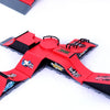 A red finger skateboard park set featuring ramps and a board, shown from above.