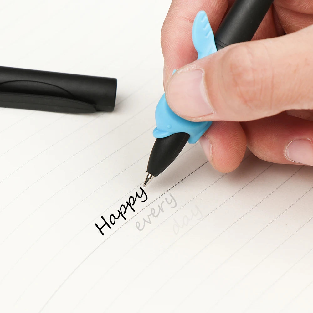 A hand is writing the phrase Happy every day on a white paper using a light blue automatic fade pen.