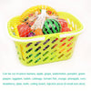 A yellow plastic basket filled with colorful pretend play fruit and vegetable food items for cutting practice