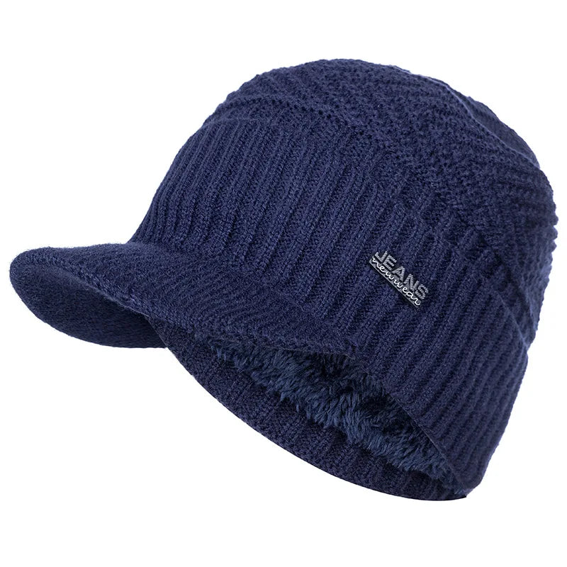 Dark blue knit beanie with a brim featuring the JEANS logo