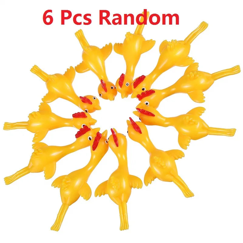Six yellow rubber chicken slingshot fidget toys arranged in a circle.