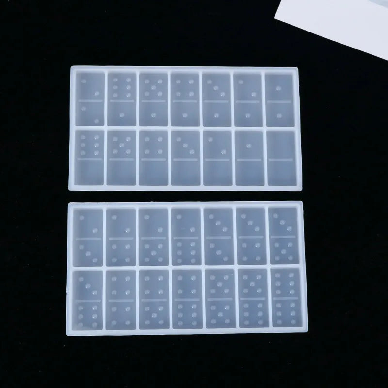 A set of silicone molds for making dominoes in epoxy resin jewelry