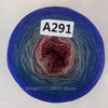 A spool of A291 cake yarn showing a rainbow gradient color transition.