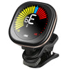 A black clip-on chromatic tuner with a backlit display showing tuning information.