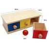 A wooden sensory toy set featuring a light wood box with colored inserts and a red wooden box.