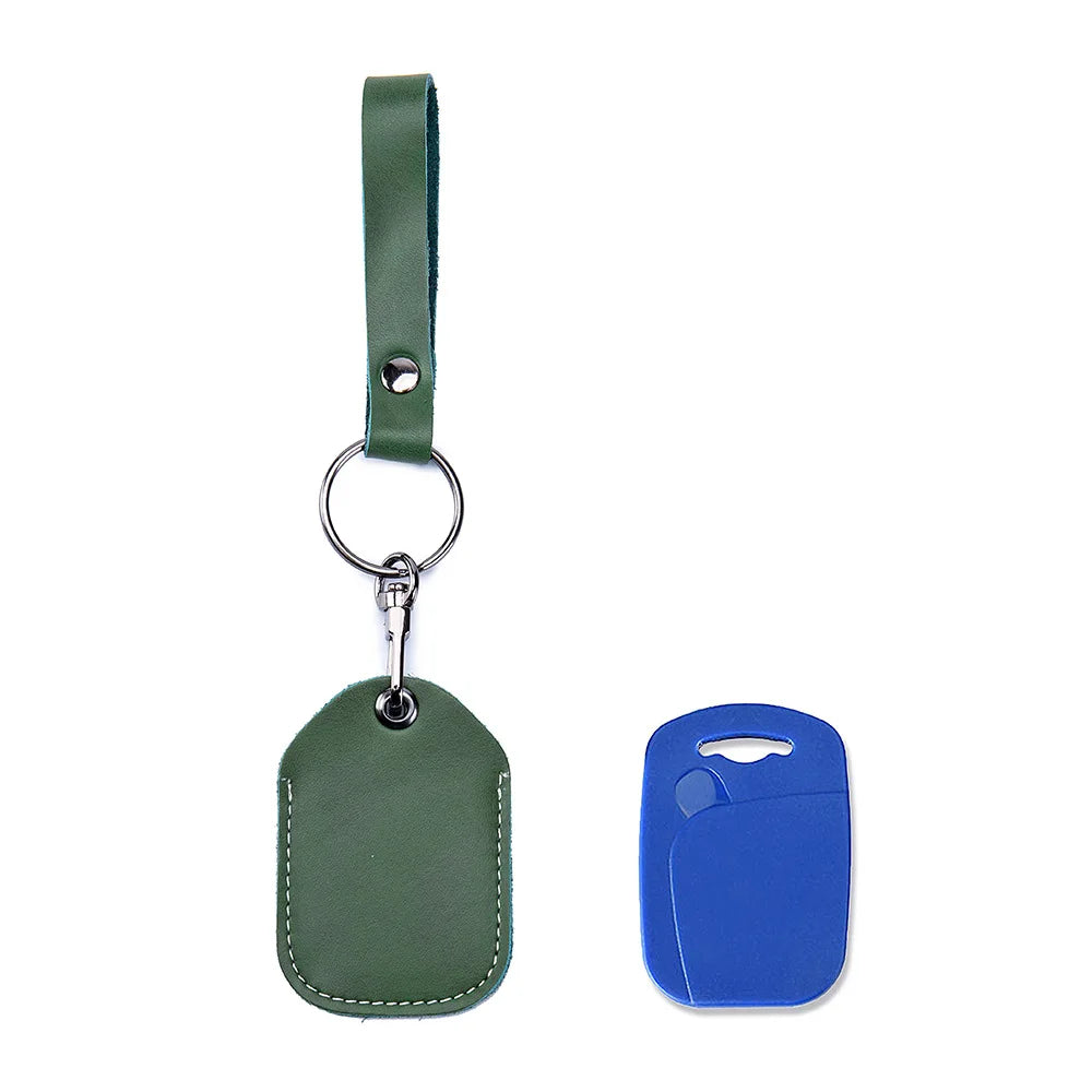 A dark olive green leather key wallet with a strap and a blue plastic card holder.