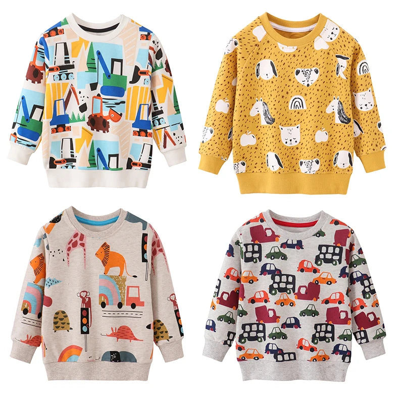 A collection of four kids' pullover sweatshirts featuring various dinosaur and animal prints in pastel and yellow tones.