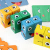 A collection of wooden face-changing cube puzzle toys in various colors like blue, yellow, and green are scattered on a white