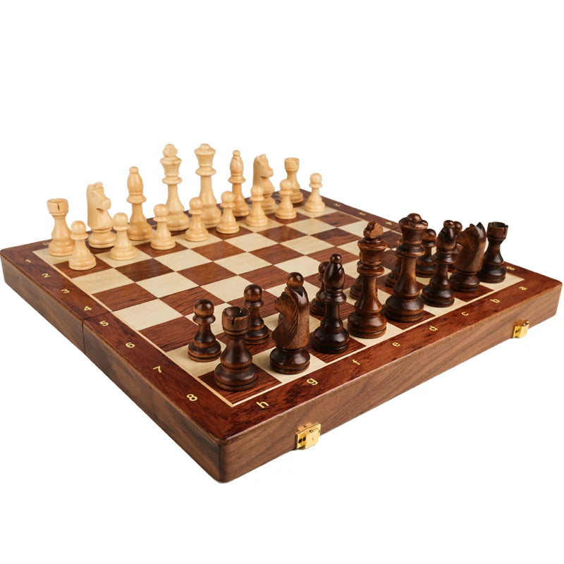 A handcrafted wooden folding chess set with solid walnut pieces displayed on a chessboard.
