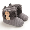 Gray plush baby snow boots for girls and boys with faux fur trim and anti-slip soles