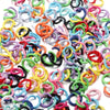 A pile of colorful metal open jump rings in various shades including pink, blue, yellow, and black.