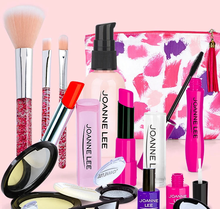 A collection of makeup brushes, lipsticks, and palettes displayed next to a pink patterned handbag.