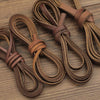 Several strands of brown faux leather cords used for DIY jewelry making