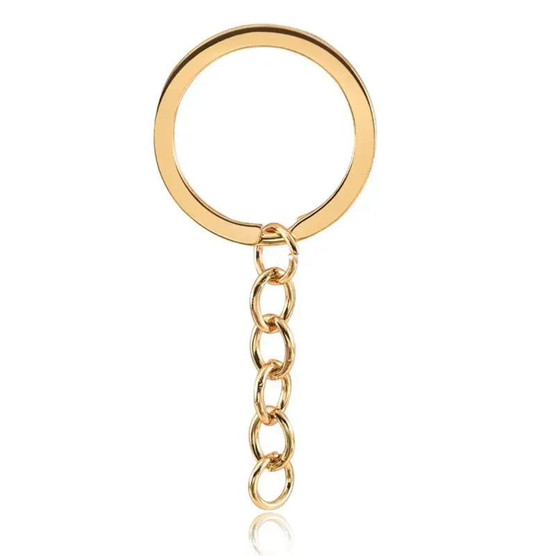 A gold-colored circular chain necklace with a small charm.
