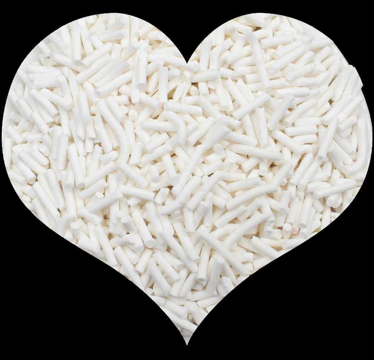 A heart shape filled with white soft polymer clay candy sprinkles for cake decorating